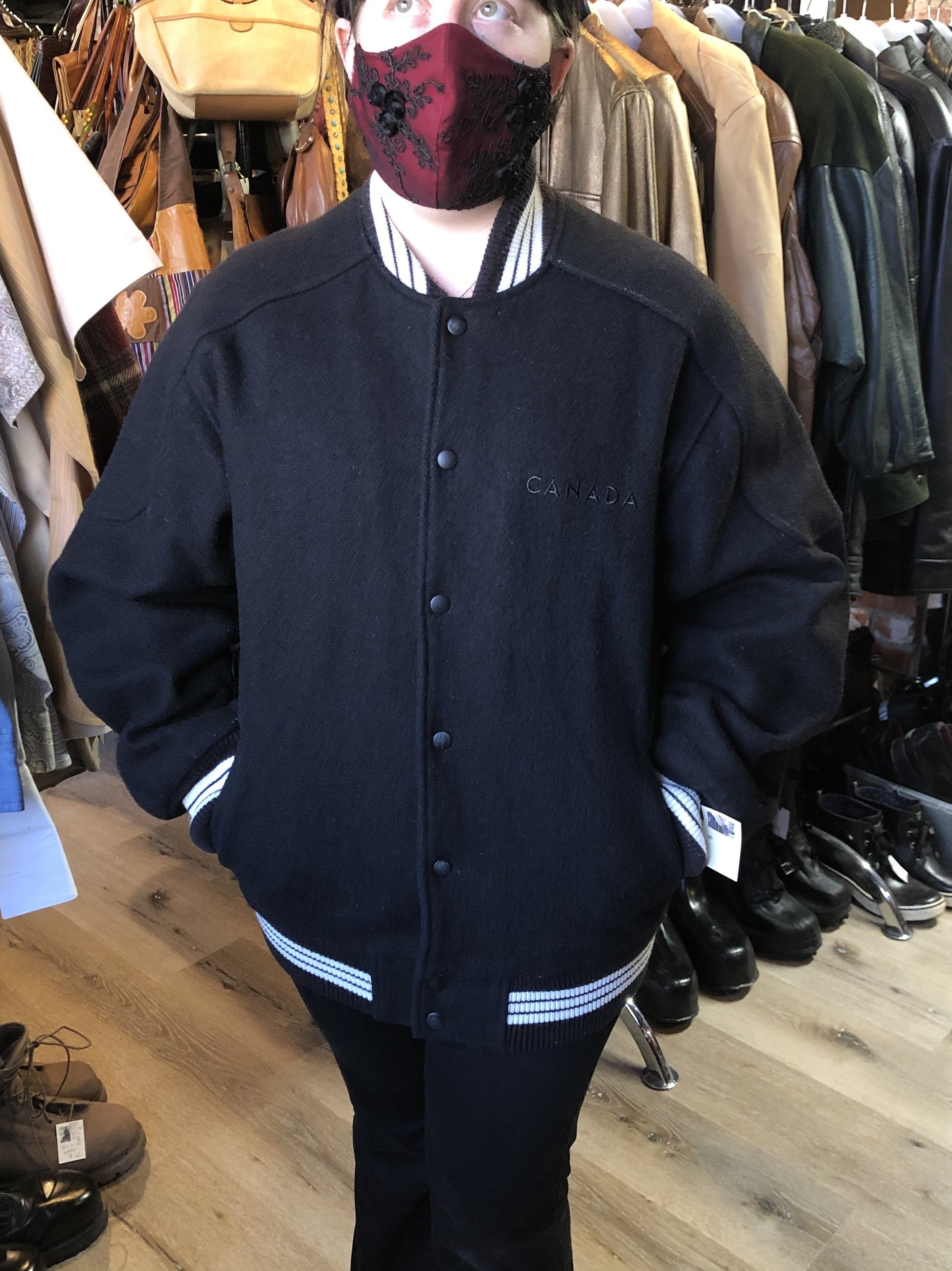 Kingspier Vintage - Retreat wool varsity jacket in black with ”Canada” printed on the chest,