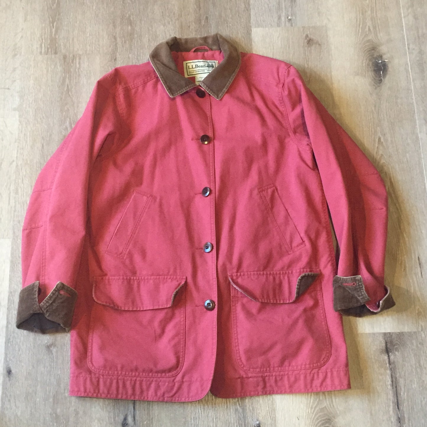 Kingspier Vintage - LL Bean red chore jacket with corduroy collar and cuffs, button closures, hand warmer pockets and flap pockets. 100% Cotton shell. Women’s size medium.