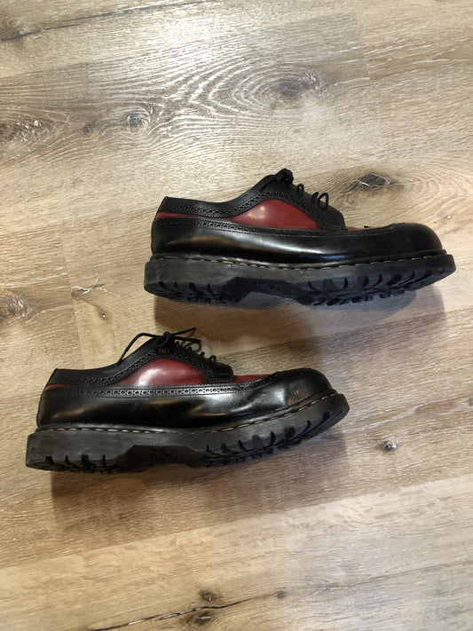 Doc Martens vintage black and red brogue style shoe with gripfast soles and steel toe.

Size 11.5 US Mens

*Shoes are in great condition.