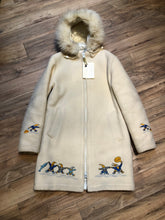 Load image into Gallery viewer, Kingspier Vintage - Vintage Hudson’s Bay Company white wool parka with embroidered northern indigenous design, fur trimmed hood, zipper closure, quilted lining and two front pockets.

Made in Canada.
