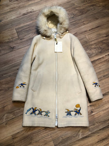 Kingspier Vintage - Vintage Hudson’s Bay Company white wool parka with embroidered northern indigenous design, fur trimmed hood, zipper closure, quilted lining and two front pockets.

Made in Canada.