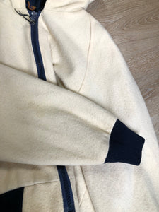 Kingspier Vintage - Woolrich white 100% wool jacket with hood, zipper closure, two zip pockets, knit trim and poly blend liner. Made in USA. Size XL.
