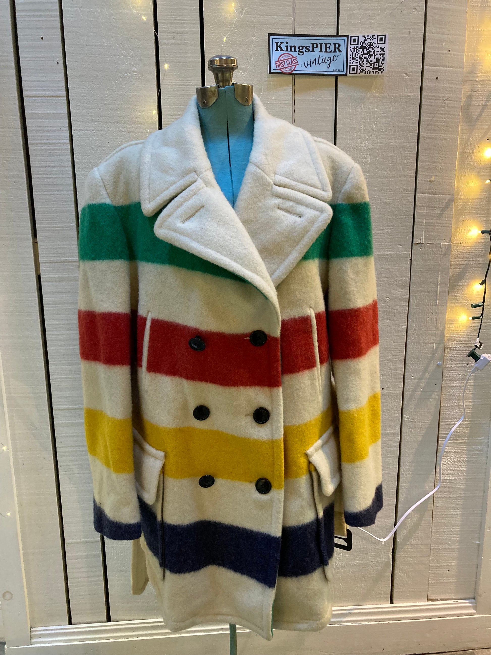 Kingspier Vintage - Vintage Hudson’s Bay Company iconic multi stripe point blanket coat with belt, double breasted button closures and front flap pockets.

Made in Canada.
Size Large.