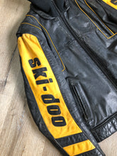 Load image into Gallery viewer, Kingspier Vintage - Bombardier Ski-Doo black and yellow leather jacket by Drospo with knit collar, zipper closure, zip pockets, quilted lining and one inside zip pocket. Made in Canada


