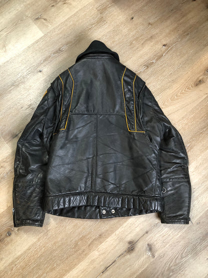 Kingspier Vintage - Bombardier Ski-Doo black and yellow leather jacket by Drospo with knit collar, zipper closure, zip pockets, quilted lining and one inside zip pocket. Made in Canada
