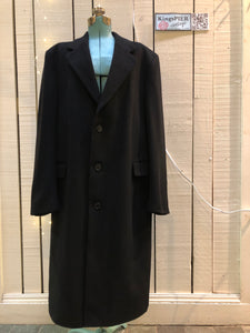 Kingspier Vintage - Vintage Baron Anderson long black coat with button closures and two flap pockets, Fibres unknown.

Made in Britain.