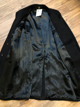 Load image into Gallery viewer, Kingspier Vintage - Vintage Baron Anderson long black coat with button closures and two flap pockets, Fibres unknown.

Made in Britain.
