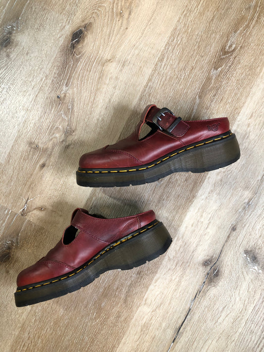 Vintage Doc Martens red smooth leather slip-on Mary Janes with Polley T-Bar strap and adjustable buckle, cap toe and air-cushioned sole. Made in England.
Size UK 6 or US 8 women’s 
*Shoes are in great condition with some minor wear in leather upper and soles.