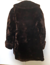Load image into Gallery viewer, Kingspier Vintage - This phenomenal piece combines the elegance of a fur with the comfort and warmth of luxurious shorn beaver fur. There are two slash pockets, ribbon belt tie inside, and 1 hook clasp in excellent condition
