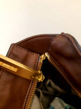 Load image into Gallery viewer, Kingspier Vintage - &lt;p&gt;Beautiful roomy hand bag with exquisitely designed hardware. &lt;br&gt;
The leather and lining are pristine with no evidence of wear.&lt;br&gt;
There is a zippered inner pocket and two pouches designed for glasses or cell phone.&lt;/p&gt;
