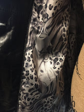 Load image into Gallery viewer, Kingspier Vintage - &lt;p&gt;This unusual mottled grey shearling 3/4 jacket is velvetty and supple. &lt;br&gt; The finish is silky and soft and the satin lining is a dramatic print of stylized wild animal hide designs.&lt;br&gt; The rich black long haired shawl collar lends a sophisticated compliment to the subtle grey palette of the jacket and the fine leather detail trims.&lt;/p&gt;
&lt;p&gt;This piece is in gorgeous as new condition.&lt;/p&gt;
