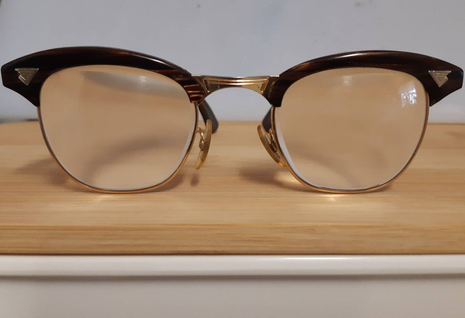 Extremely rare vintage redwood & gold American Optical Sirmont