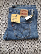 Load image into Gallery viewer, Kingspier Vintage - Classic Levi&#39;s 501 button fly.
Made in Mexico. 34&quot;x34&quot; 
Very good condition
Slight styled distress fade as pictured.
Gently broken in
