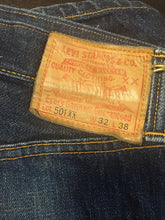 Load image into Gallery viewer, Kingspier Vintage - Classic vintage Levi&#39;s 501xx button fly.,32&quot;x38&quot;, Hemmed to 35&quot; inseam,.Made in USA 
Hommage to pre-1960s styles, this pair belonged to musician Joel Plaskett so they are  a very cool piece of indie rock memorabilia. 
Excellent condition, Gently broken in with fading at knees and cuff creases at 1 1/2&quot; up from hem.
