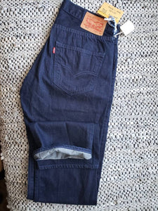 Kingspier Vintage - Special edition classic vintage Levi's 501 button fly w/American flag buttons and pockets. 
Leather patch
 33"x32" 
Made in Turkey.
Deep blue rinse light weight denim.
Excellent condition
As new.