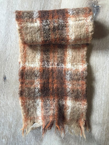 Kingspier Vintage - <p>Vintage brown mohair plaid scarf. Measures 9x54 inches.</p>
