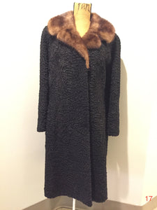 Kingspier Vintage - American Furriers" Black Persian Lamb full length coat with light brown mink collar. Made in St. Johns Canada. This coat features metal clasps, black lining with white flower motif, inside pocket with embroidered monogram "LAB" and American furriers label.