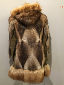 Kingspier Vintage - Vintage Northern Canadian hooded fur and suede coat with fox fur trim. This coat features a beautiful diagonal patterned in the fur accented with suede pieces, snap closures, fun patterned lining and inside pocket.