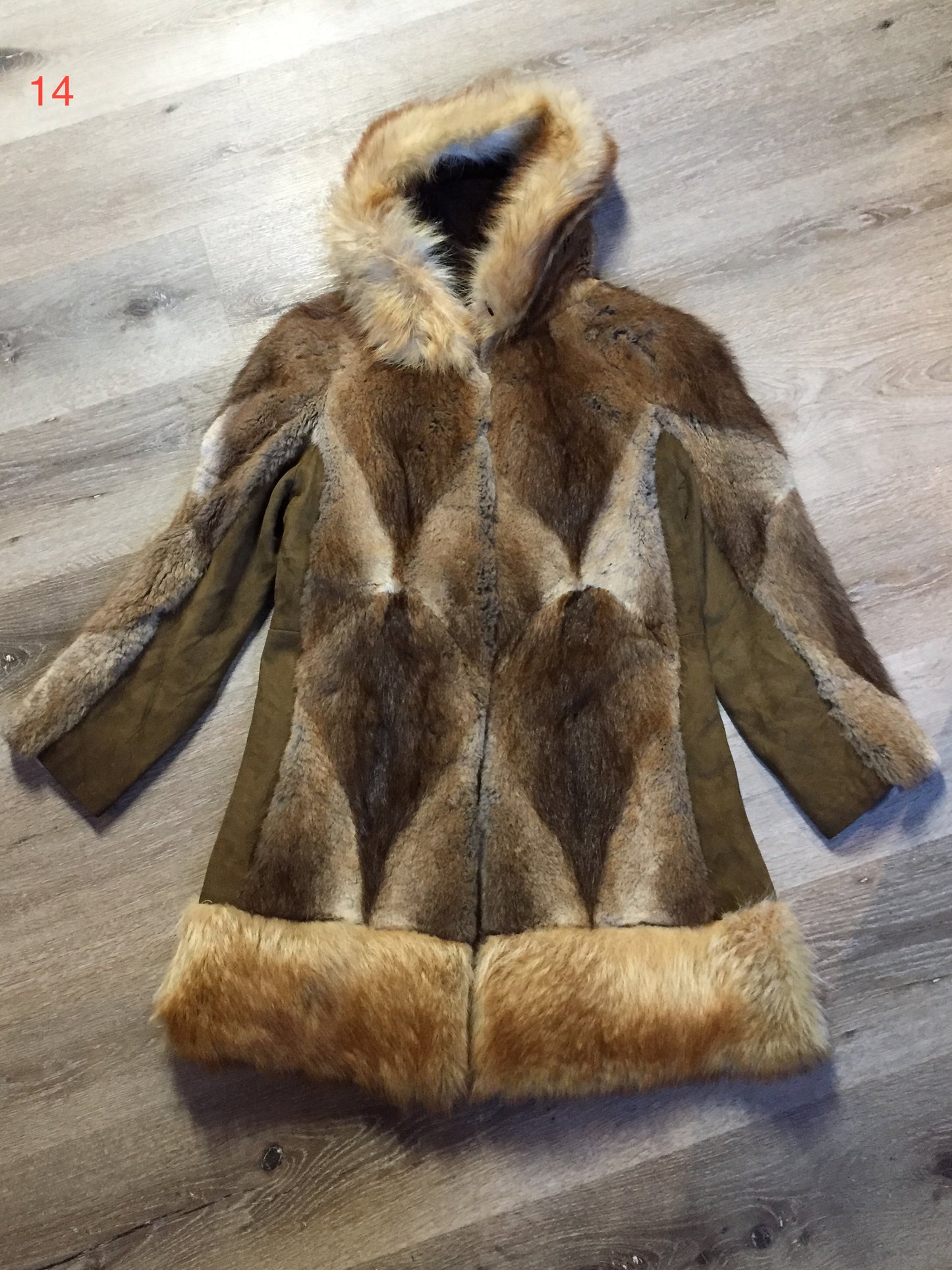 Kingspier Vintage - Vintage Northern Canadian hooded fur and suede coat with fox fur trim. This coat features a beautiful diagonal patterned in the fur accented with suede pieces, snap closures, fun patterned lining and inside pocket.